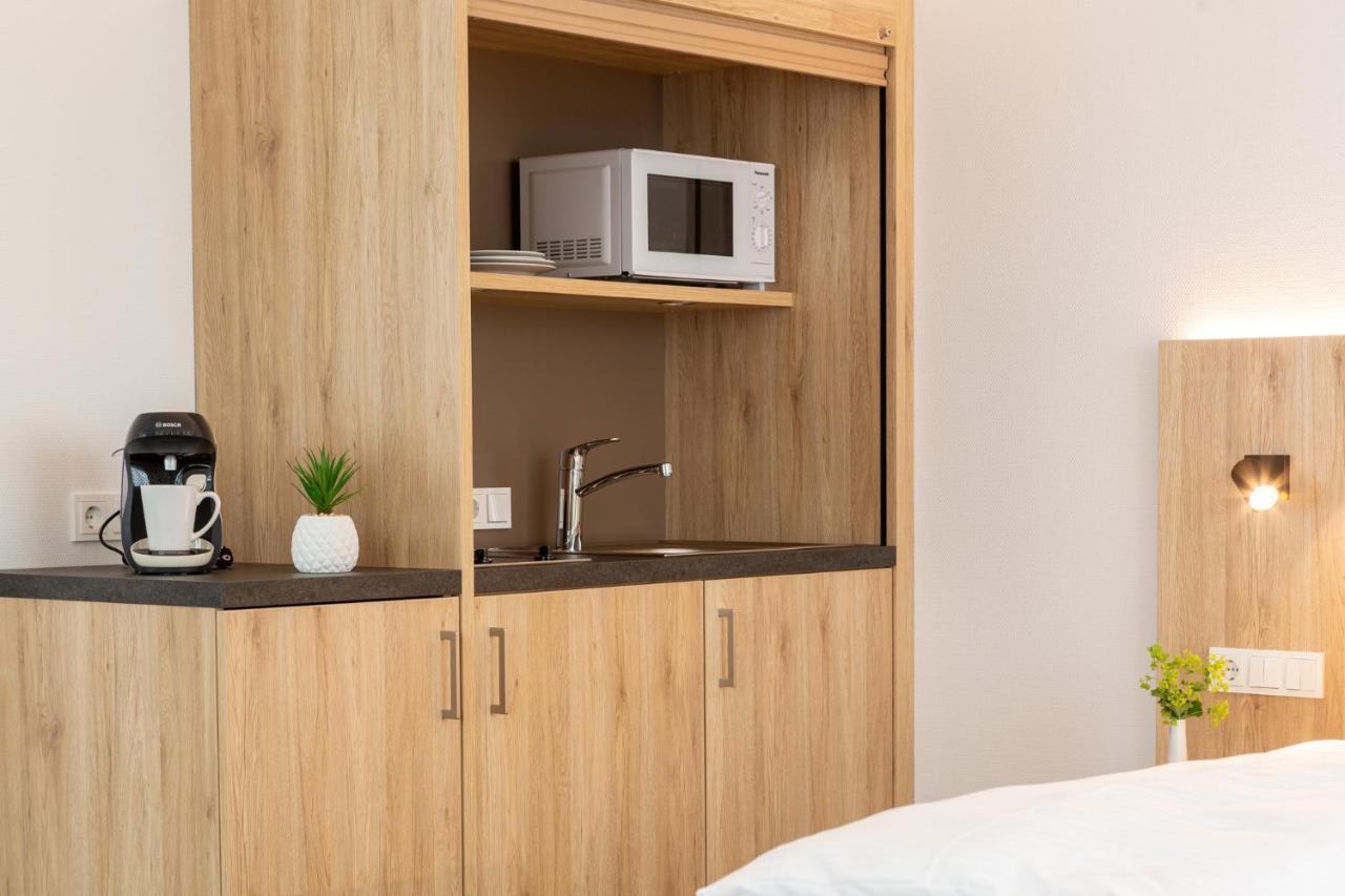 Aparthotel Am Pfaffenstein Klein-Winternheim Buitenkant foto